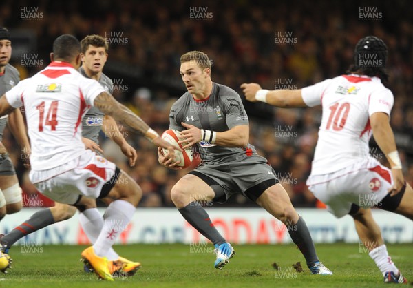 221113 Wales v Tonga…Wales George North takes on Fetuu Vainikolo  and Latiume Fosita of Tonga(c) Huw Evans, Cardiff