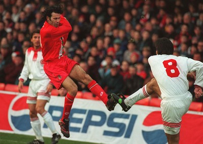 141296 - Wales v Turkey - Ryan Giggs of Wales tries to stop Ogun Temizkanogiu