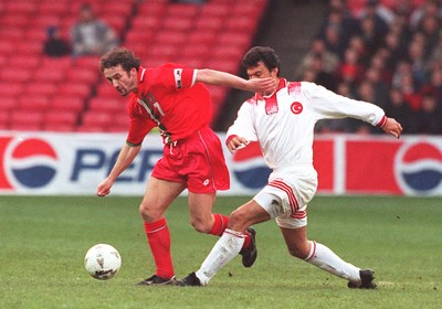 141296 - Wales v Turkey - Barry Horne of Wales holds off Abdullah Ercan