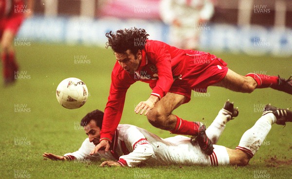 141296 - Wales v Turkey - Ryan Giggs of Wales is tackled by Recep Cetin