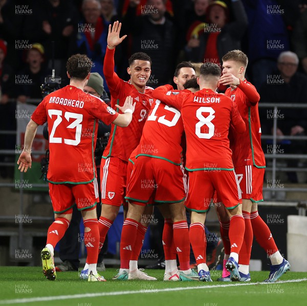211123 - Wales v Turkey - UEFA Euro 2024 Qualifier - Neco Williams of Wales celebrates scoring a goal with team mates