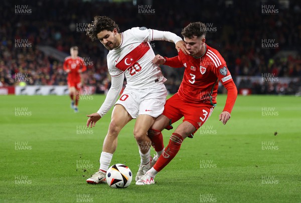 211123 - Wales v Turkey - UEFA Euro 2024 Qualifier - Neco Williams of Wales is tackled by Ferdi Kadioglu of Turkey 