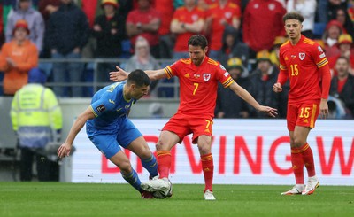 050622 -  Wales v Ukraine, World Cup Qualifying Play Off Final - Ruslan Malinovskyi of Ukraine is tackled by Joe Allen of Wales