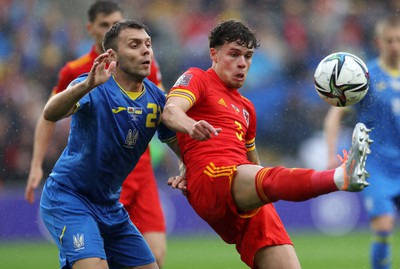 050622 -  Wales v Ukraine, World Cup Qualifying Play Off Final - Neco Williams of Wales is challenged by Oleksandr Karavaev of Ukrain