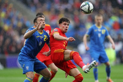 050622 -  Wales v Ukraine, World Cup Qualifying Play Off Final - Neco Williams of Wales is challenged by Oleksandr Karavaev of Ukrain