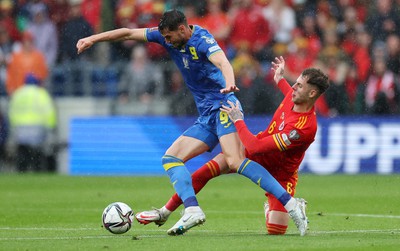 050622 -  Wales v Ukraine, World Cup Qualifying Play Off Final - Roman Yaremchuk of Ukraine is tackled by Joe Rodon of Wale