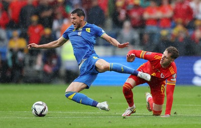 050622 -  Wales v Ukraine, World Cup Qualifying Play Off Final - Roman Yaremchuk of Ukraine is tackled by Joe Rodon of Wale