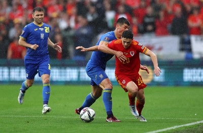 050622 -  Wales v Ukraine, World Cup Qualifying Play Off Final - Dan James of Wales is challenged by Ruslan Malinovskyi of Ukraine