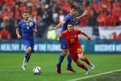 050622 -  Wales v Ukraine, World Cup Qualifying Play Off Final - Dan James of Wales is challenged by Ruslan Malinovskyi of Ukraine