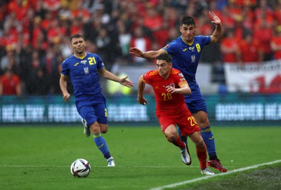 050622 -  Wales v Ukraine, World Cup Qualifying Play Off Final - Dan James of Wales is challenged by Ruslan Malinovskyi of Ukraine