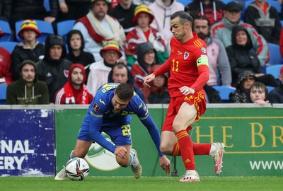 050622 -  Wales v Ukraine, World Cup Qualifying Play Off Final - Gareth Bale of Wales is challenged by Mykola Matviyenko of Ukraine