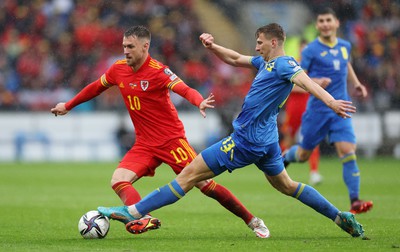 050622 -  Wales v Ukraine, World Cup Qualifying Play Off Final - Aaron Ramsey of Wales is challenged by Illia Zabarnyi of Ukraine