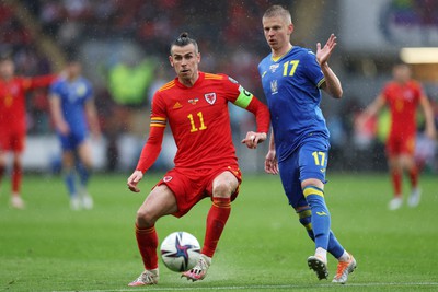 050622 -  Wales v Ukraine, World Cup Qualifying Play Off Final - Gareth Bale of Wales is challenged by Oleksandr Zinchenko of Ukraine