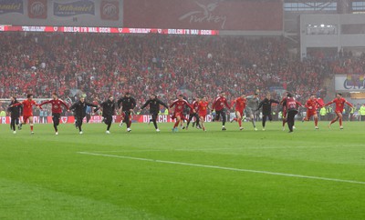 050622 -  Wales v Ukraine, World Cup Qualifying Play Off Final - Wales players celebrate as they reach the World Cup Finals