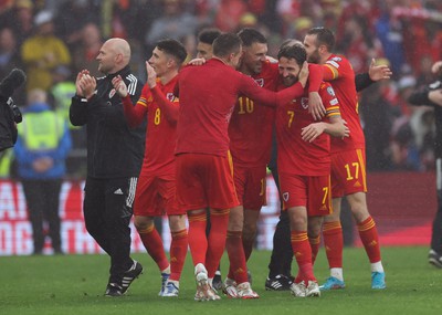 050622 -  Wales v Ukraine, World Cup Qualifying Play Off Final - Chris Gunter, Aaron Ramsey and Joe Allen of Wales celebrate as Wales reach the World Cup Finals