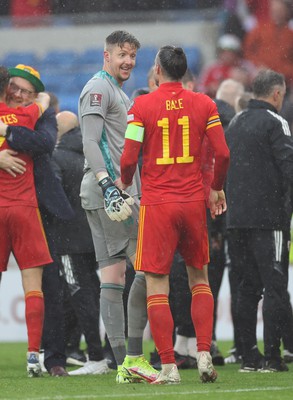 050622 -  Wales v Ukraine, World Cup Qualifying Play Off Final - Wales goalkeeper Wayne Hennessey and Gareth Bale of Wales celebrate as Wales reach the World Cup Finals