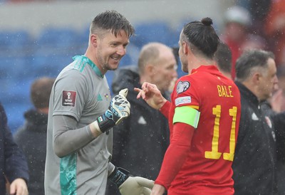 050622 -  Wales v Ukraine, World Cup Qualifying Play Off Final - Wales goalkeeper Wayne Hennessey and Gareth Bale of Wales celebrate as Wales reach the World Cup Finals