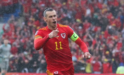 050622 -  Wales v Ukraine, World Cup Qualifying Play Off Final - Gareth Bale of Wales celebrates after his free kick is deflected into the Ukraine net to score goal