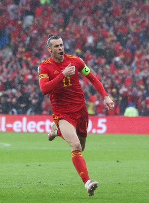 050622 -  Wales v Ukraine, World Cup Qualifying Play Off Final - Gareth Bale of Wales celebrates after his free kick is deflected into the Ukraine net to score goal