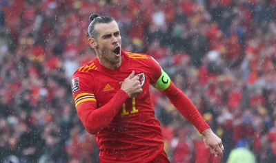 050622 -  Wales v Ukraine, World Cup Qualifying Play Off Final - Gareth Bale of Wales celebrates after his free kick is deflected into the Ukraine net to score goal