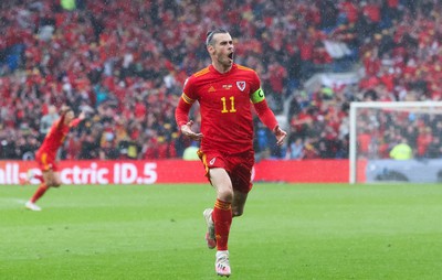 050622 -  Wales v Ukraine, World Cup Qualifying Play Off Final - Gareth Bale of Wales celebrates after his free kick is deflected into the Ukraine net to score goal