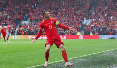 050622 -  Wales v Ukraine, World Cup Qualifying Play Off Final - Gareth Bale of Wales celebrates after his free kick is deflected into the Ukraine net to score goal