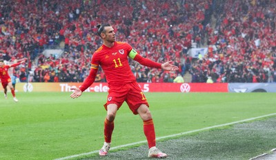 050622 -  Wales v Ukraine, World Cup Qualifying Play Off Final - Gareth Bale of Wales celebrates after his free kick is deflected into the Ukraine net to score goal