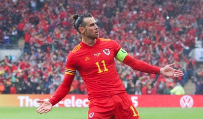 050622 -  Wales v Ukraine, World Cup Qualifying Play Off Final - Gareth Bale of Wales celebrates after his free kick is deflected into the Ukraine net to score goal