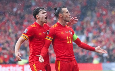 050622 -  Wales v Ukraine, World Cup Qualifying Play Off Final - Gareth Bale of Wales celebrates with Neco Williams of Wales after his free kick is deflected into the Ukraine net to score goal