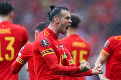 050622 -  Wales v Ukraine, World Cup Qualifying Play Off Final - Gareth Bale of Wales celebrates after his free kick is deflected into the Ukraine net to score goal