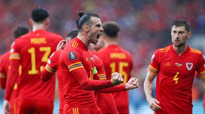 050622 -  Wales v Ukraine, World Cup Qualifying Play Off Final - Gareth Bale of Wales celebrates after his free kick is deflected into the Ukraine net to score goal