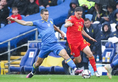 050622 -  Wales v Ukraine, World Cup Qualifying Play Off Final - Dan James of Wales takes on Taras Stepanenko of Ukraine