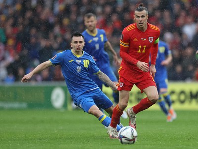 050622 -  Wales v Ukraine, World Cup Qualifying Play Off Final - Gareth Bale of Wales gets away from Mykola Shaparenko of Ukraine