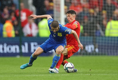 050622 -  Wales v Ukraine, World Cup Qualifying Play Off Final - Vitalii Mykolenko of Ukraine is challenged by Harry Wilson of Wales