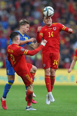 050622 -  Wales v Ukraine, World Cup Qualifying Play Off Final - Connor Roberts of Wales heads the ball forward