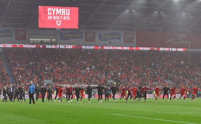 050622 -  Wales v Ukraine, World Cup Qualifying Play Off Final - Wales players celebrate as they reach the World Cup Finals