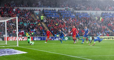 050622 -  Wales v Ukraine, World Cup Qualifying Play Off Final - Andriy Yarmolenko of Ukraine deflects Gareth Bale’s free kick into the Ukraine net to give Wales the winning goal