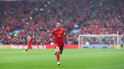 050622 -  Wales v Ukraine, World Cup Qualifying Play Off Final - Gareth Bale of Wales celebrates after his free kick is deflected into the Ukraine net to score goal