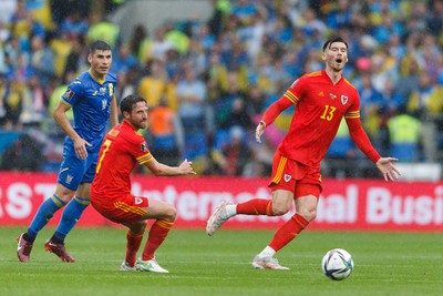 050622 -  Wales v Ukraine, World Cup Qualifying Play Off Final - Joe Allen and Kieffer Moore of Wales react