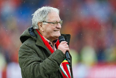 050622 -  Wales v Ukraine, World Cup Qualifying Play Off Final - Dafydd Iwan celebrates after the game by singing Yma o Hyd