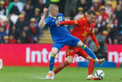 050622 -  Wales v Ukraine, World Cup Qualifying Play Off Final - Aaron Ramsey of Wales and Oleksandr Zinchenko of Ukraine battle for the ball