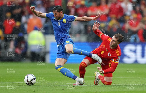 050622 -  Wales v Ukraine, World Cup Qualifying Play Off Final - Roman Yaremchuk of Ukraine is tackled by Joe Rodon of Wale