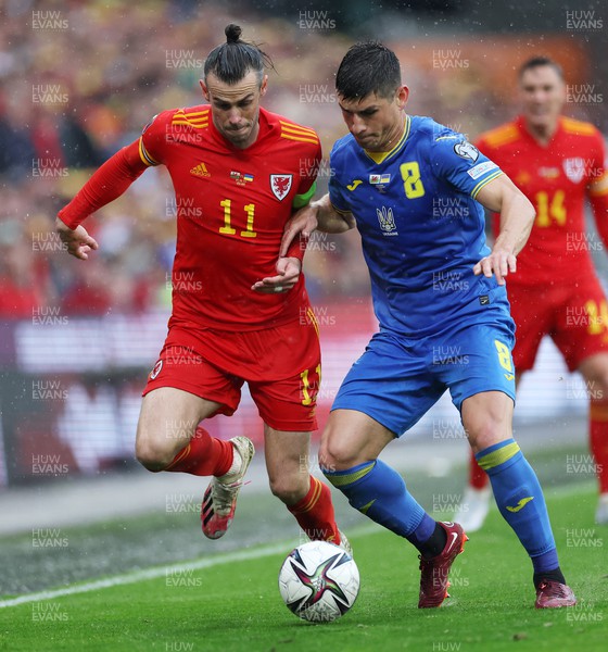 050622 -  Wales v Ukraine, World Cup Qualifying Play Off Final - Gareth Bale of Wales is challenged by Ruslan Malinovskyi of Ukraine