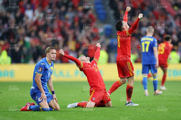 050622 -  Wales v Ukraine, World Cup Qualifying Play Off Final - Connor Roberts celebrates alongside Harry Wilson of Wales at full time