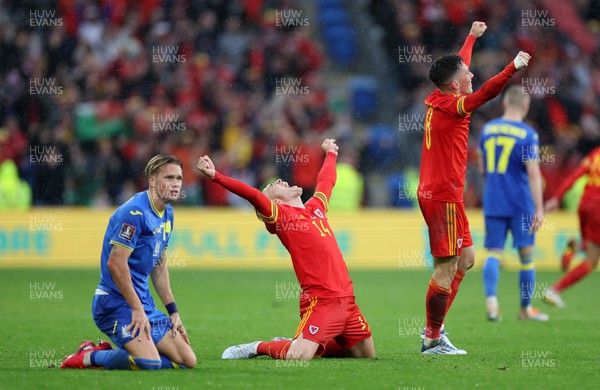 050622 -  Wales v Ukraine, World Cup Qualifying Play Off Final - Connor Roberts celebrates alongside Harry Wilson of Wales at full time