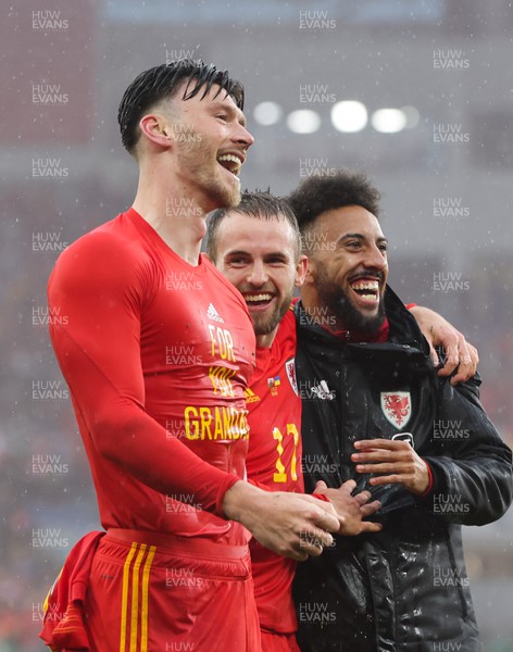 050622 -  Wales v Ukraine, World Cup Qualifying Play Off Final - Kieffer Moore of Wales, Rhys Norrington-Davies of Wales and Sorba Thomas of Wales celebrate as Wales reach the World Cup Finals