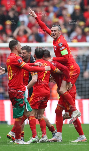 050622 -  Wales v Ukraine, World Cup Qualifying Play Off Final - Gareth Bale of Wales celebrates with team mates as Wales reach the World Cup Finals