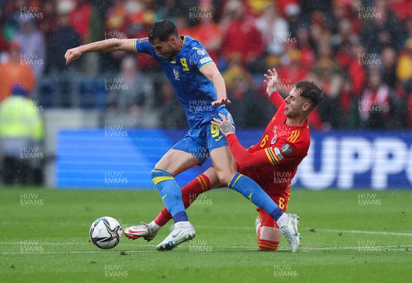 050622 -  Wales v Ukraine, World Cup Qualifying Play Off Final - Joe Rodon of Wales and Roman Yaremchuk of Ukraine compete for the ball