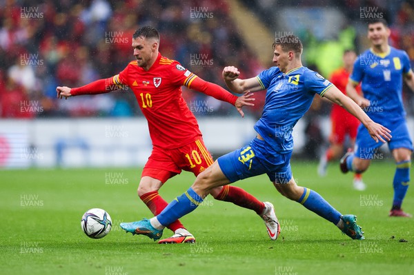 050622 -  Wales v Ukraine, World Cup Qualifying Play Off Final -Aaron Ramsey of Wales takes on Illia Zabarnyi of Ukraine