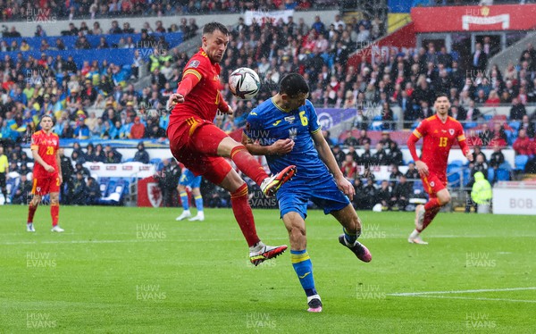 050622 -  Wales v Ukraine, World Cup Qualifying Play Off Final - Aaron Ramsey of Wales and Taras Stepanenko of Ukraine compete for the ball